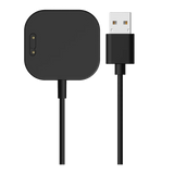 Sort magnetisk oplader med USB-stik til Xplora X6 Play. Viser opladningspad'en med to guldstik og et USB-A-stik for nem tilslutning.