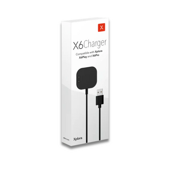 Emballage til Xplora X6-oplader. Viser sort magnetisk opladningskabel med USB til Xplora X6 Play og X6 Pro børneur.