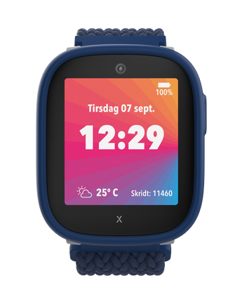 Blåt Xplora X6Play børneur med farverig skærm. Viser dato, tid (12:29), temperatur (25 °C) og antal skridt (11.460).