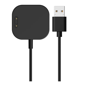 Sort magnetisk oplader med USB-stik til Xplora X6 Play. Viser opladningspad'en med to guldstik og et USB-A-stik for nem tilslutning.